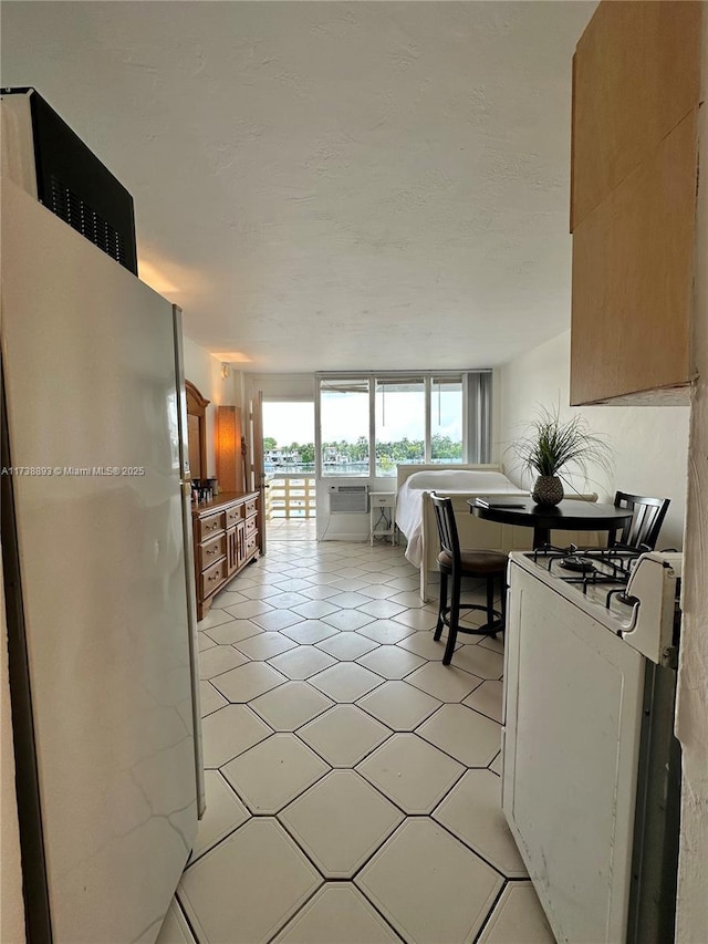 dining area with light tile patterned floors