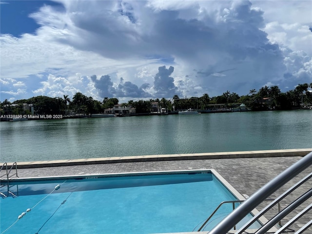 pool featuring a water view