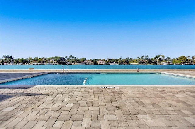 pool featuring a patio area