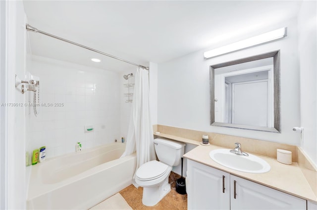 full bathroom with vanity, shower / bath combo with shower curtain, and toilet