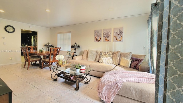 tiled living room with ornamental molding