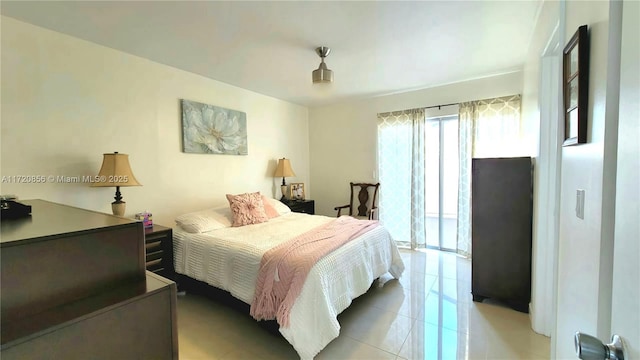 bedroom featuring light tile patterned flooring