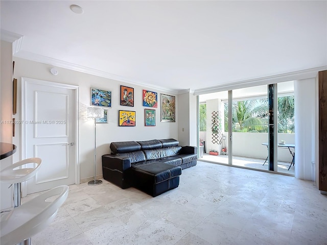 living room with ornamental molding and floor to ceiling windows