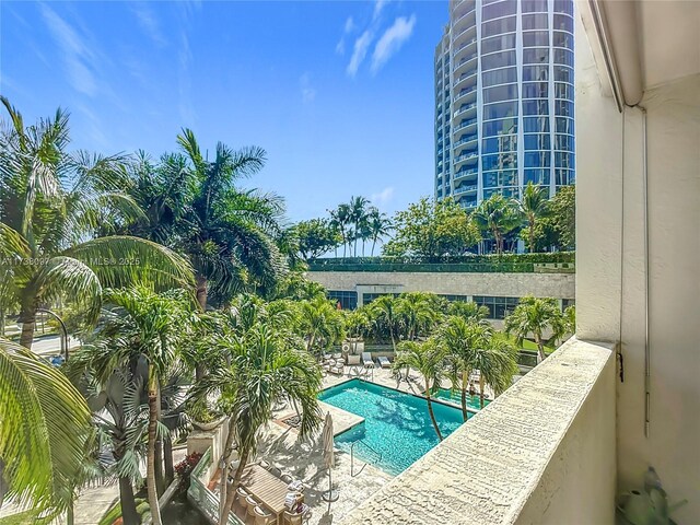 3400 SW 27th Ave Unit 302, Miami, FL 33133 - view of swimming pool featuring a patio area