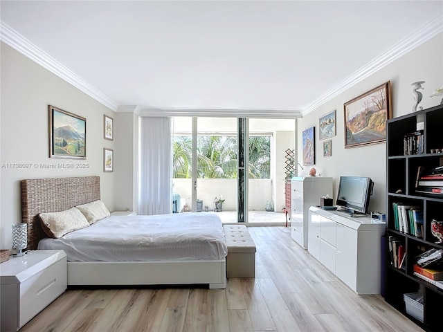 3400 SW 27th Ave Unit 302, Miami, FL 33133 - bedroom featuring ornamental molding, floor to ceiling windows, access to exterior, and light wood-type flooring