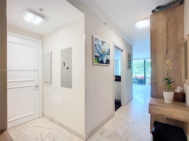 corridor with ornamental molding and electric panel