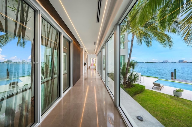 balcony featuring a water view