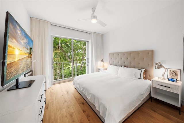 bedroom with wood-type flooring and ceiling fan