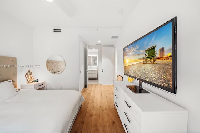 bedroom featuring light hardwood / wood-style flooring