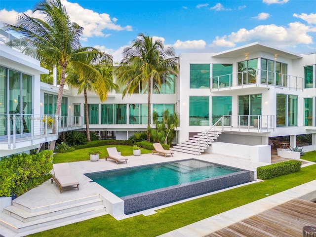 rear view of house featuring a patio area