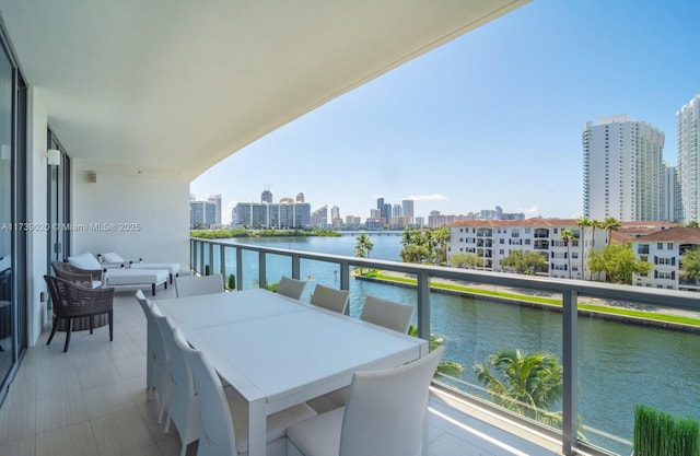 balcony featuring a water view