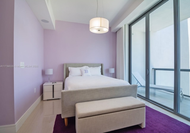 tiled bedroom with access to outside