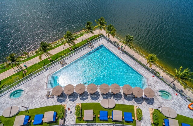 drone / aerial view with a water view