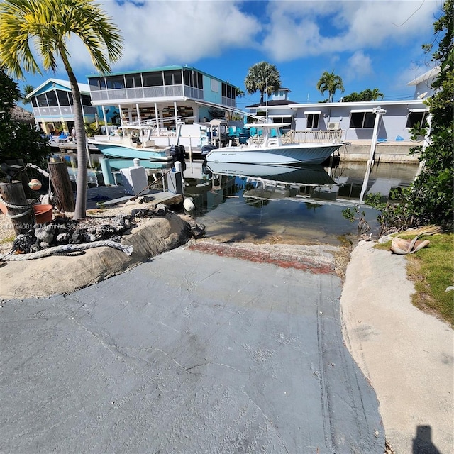 view of dock with boat lift