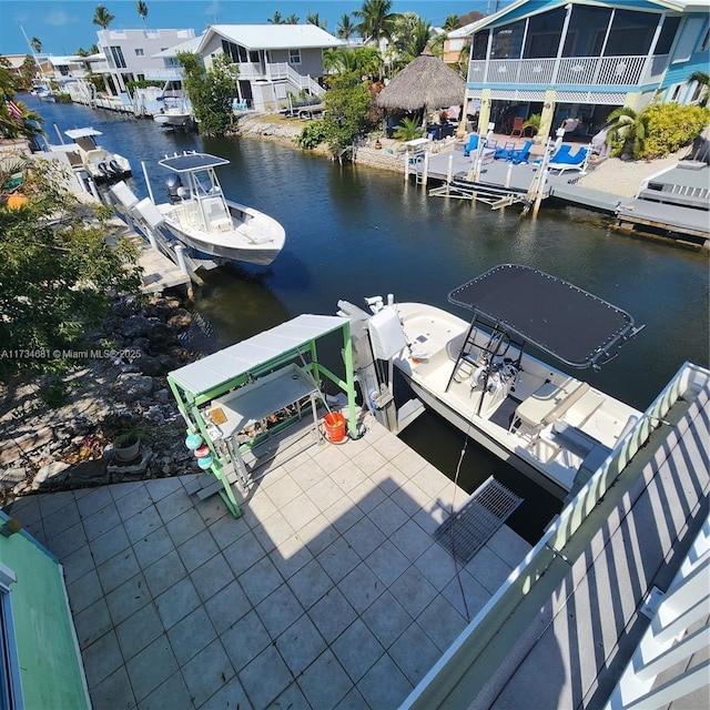 view of dock featuring a water view and boat lift