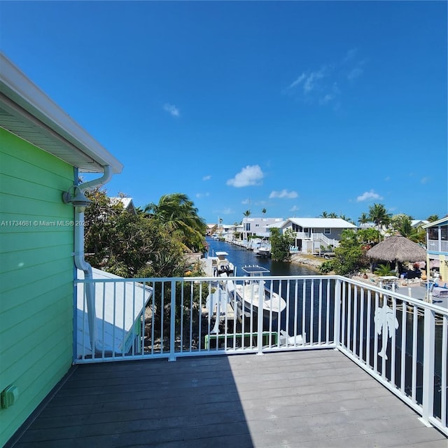 deck featuring a water view