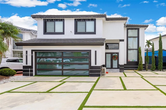 view of front of house featuring french doors and a garage