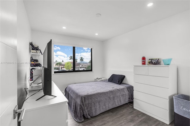 bedroom featuring hardwood / wood-style floors