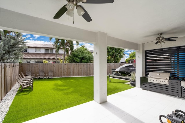 view of patio with ceiling fan