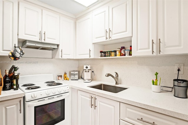 kitchen featuring sink, range hood, white cabinets, decorative backsplash, and white electric stove