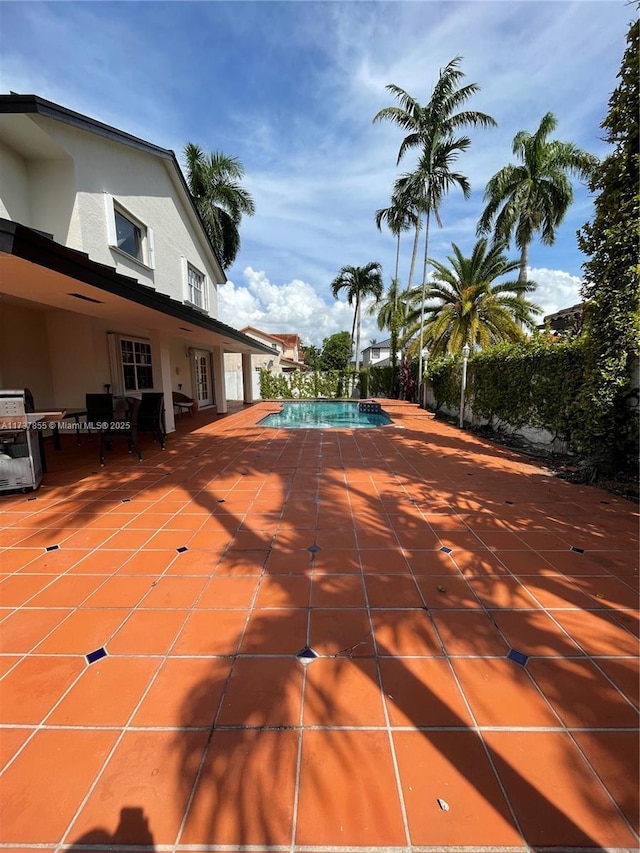 view of pool with a patio area