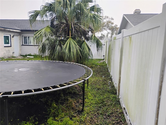 view of yard featuring a trampoline