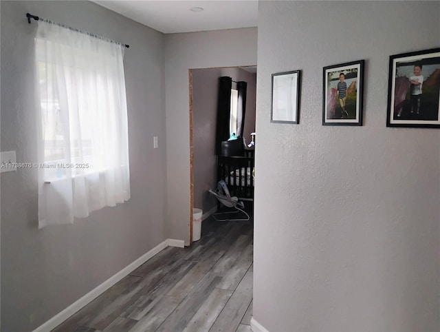 hallway featuring light hardwood / wood-style floors