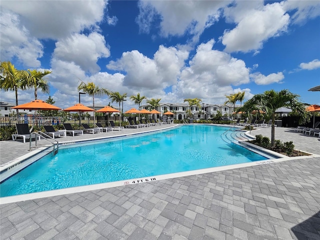 view of pool with a gazebo and a patio