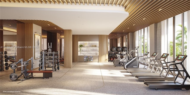 exercise room with floor to ceiling windows