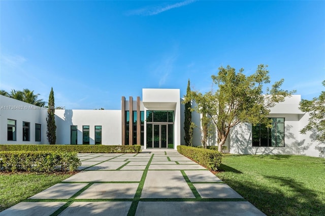 exterior space with a front lawn