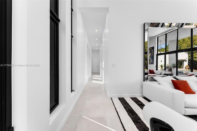 hallway with light tile patterned floors