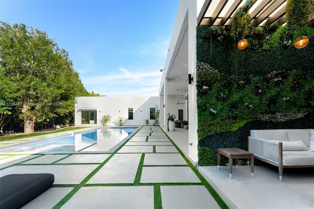 view of pool featuring a patio