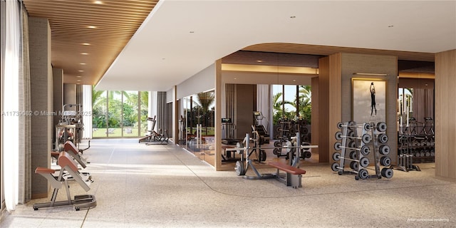 workout area featuring floor to ceiling windows