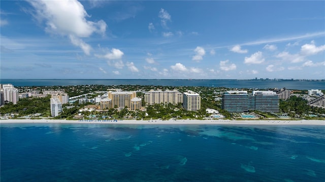 bird's eye view featuring a beach view and a water view