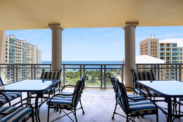 balcony featuring a water view