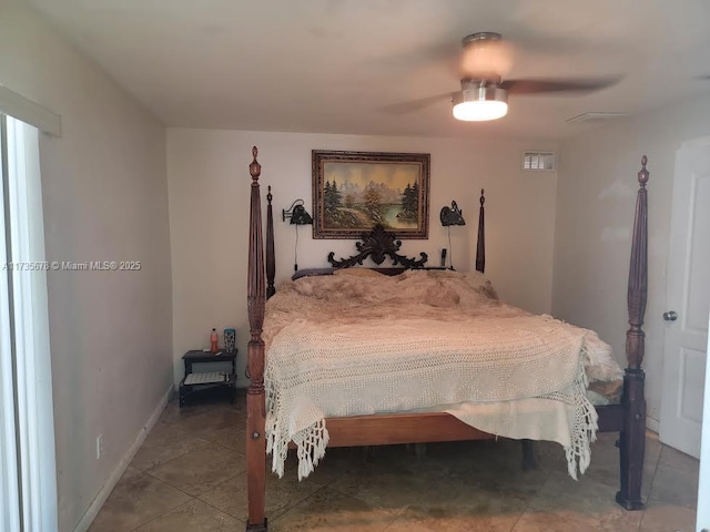 bedroom with tile patterned flooring and ceiling fan