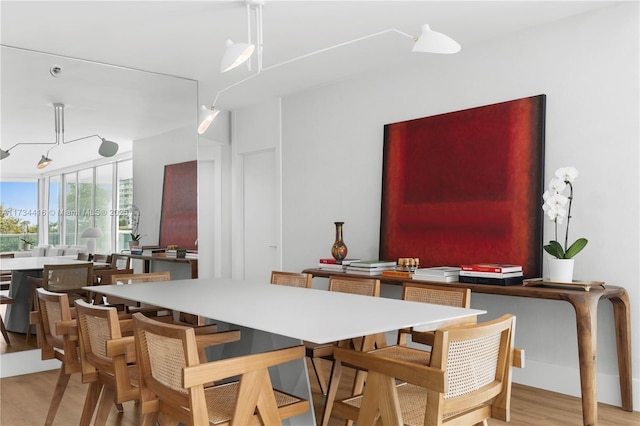 2127 Brickell Ave Unit 705, Miami, FL 33129 - dining room with light wood-type flooring