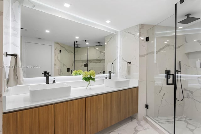 2127 Brickell Ave Unit 705, Miami, FL 33129 - full bathroom featuring marble tiled flooring, a marble finish shower, double vanity, and recessed lighting