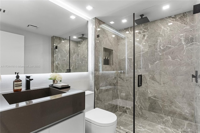 2127 Brickell Ave Unit 705, Miami, FL 33129 - full bathroom featuring a marble finish shower, recessed lighting, and vanity