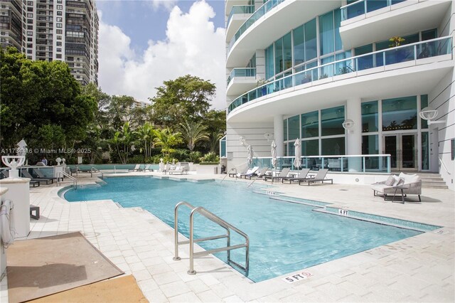2127 Brickell Ave Unit 705, Miami, FL 33129 - community pool featuring a patio