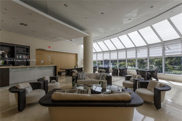 2127 Brickell Ave Unit 705, Miami, FL 33129 - building lobby featuring a towering ceiling