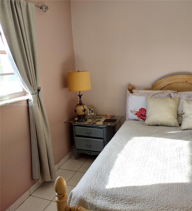 2145 Pierce St Unit 105, Hollywood, FL 33020 - bedroom featuring light tile patterned floors and baseboards