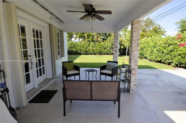 view of patio / terrace with outdoor lounge area, ceiling fan, and french doors