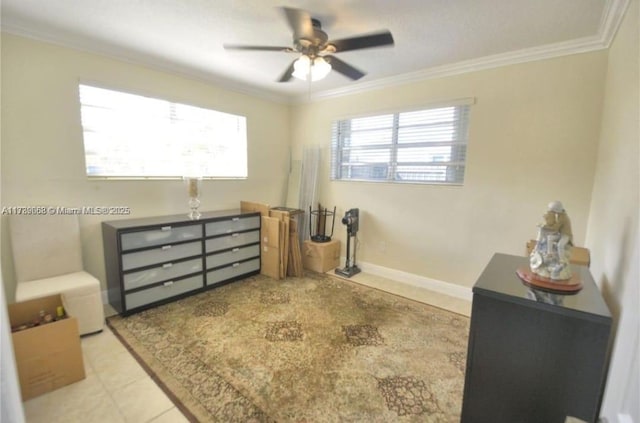 bedroom with ceiling fan and ornamental molding