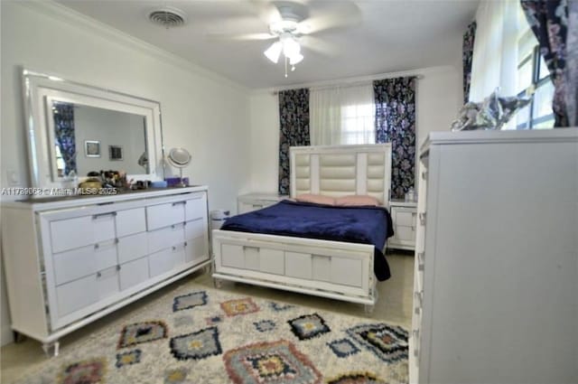 bedroom featuring crown molding and ceiling fan