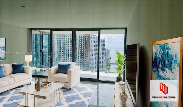 living room with floor to ceiling windows and plenty of natural light