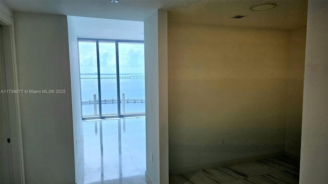 interior space featuring a water view