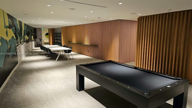 recreation room featuring pool table, carpet, and wood walls