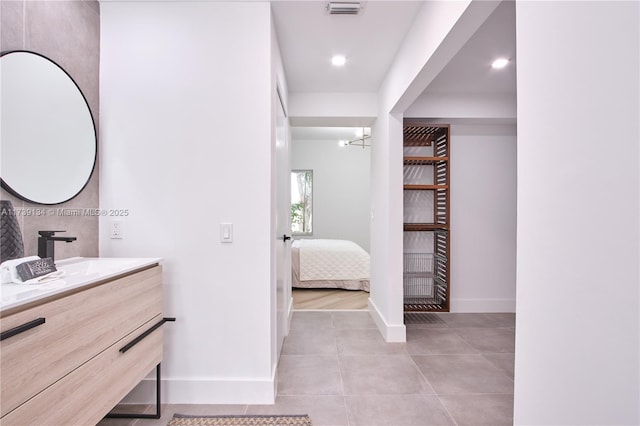 bathroom featuring vanity and tile patterned floors