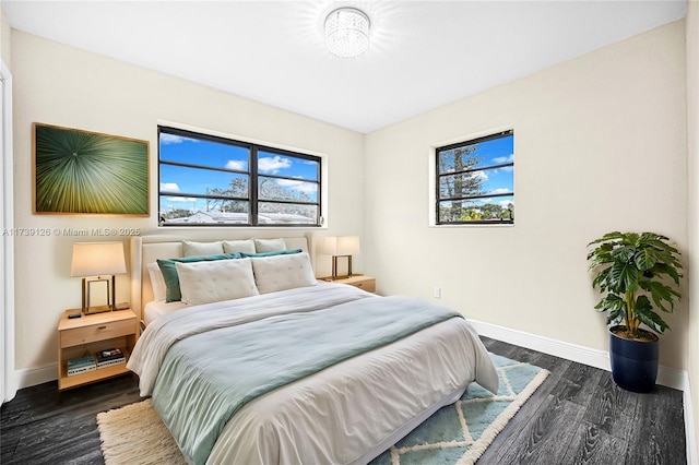 bedroom featuring dark wood-type flooring